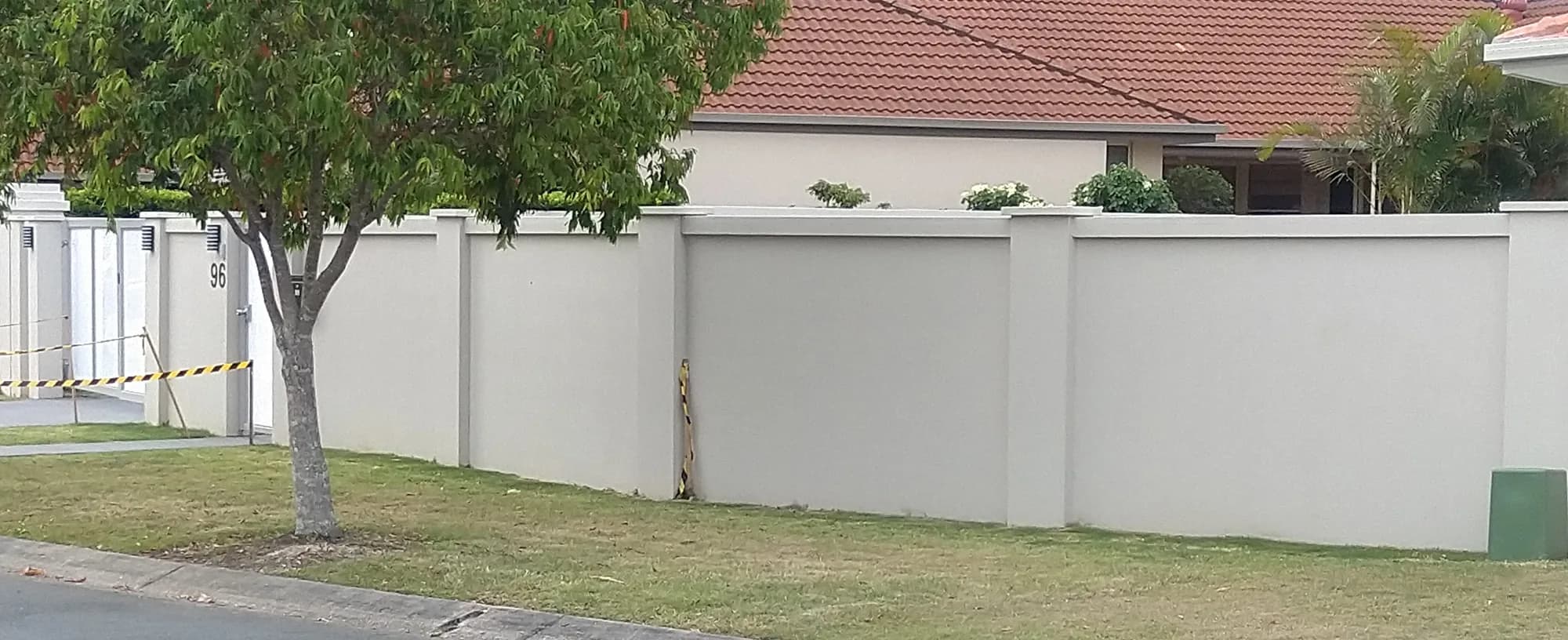Panels and piers concrete fence style