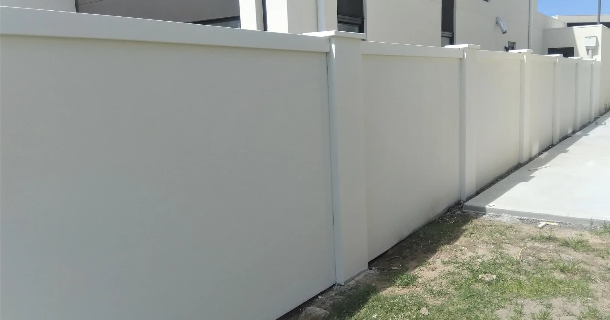 Panels and piers concrete fence style